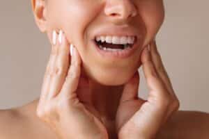 Cropped,Shot,Of,A,Young,Woman,Suffering,From,Jaw,Pain